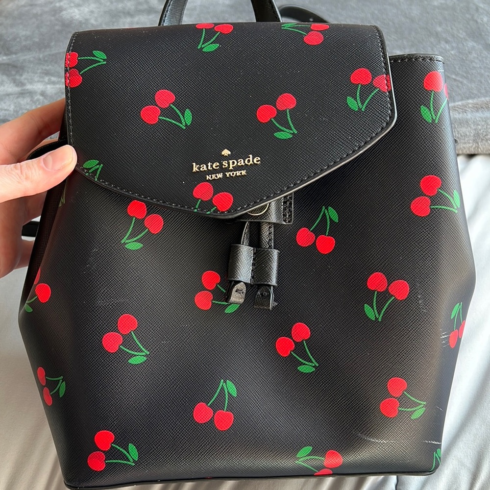 Kate spade back pack bag. Small white scuff. Shown in picture